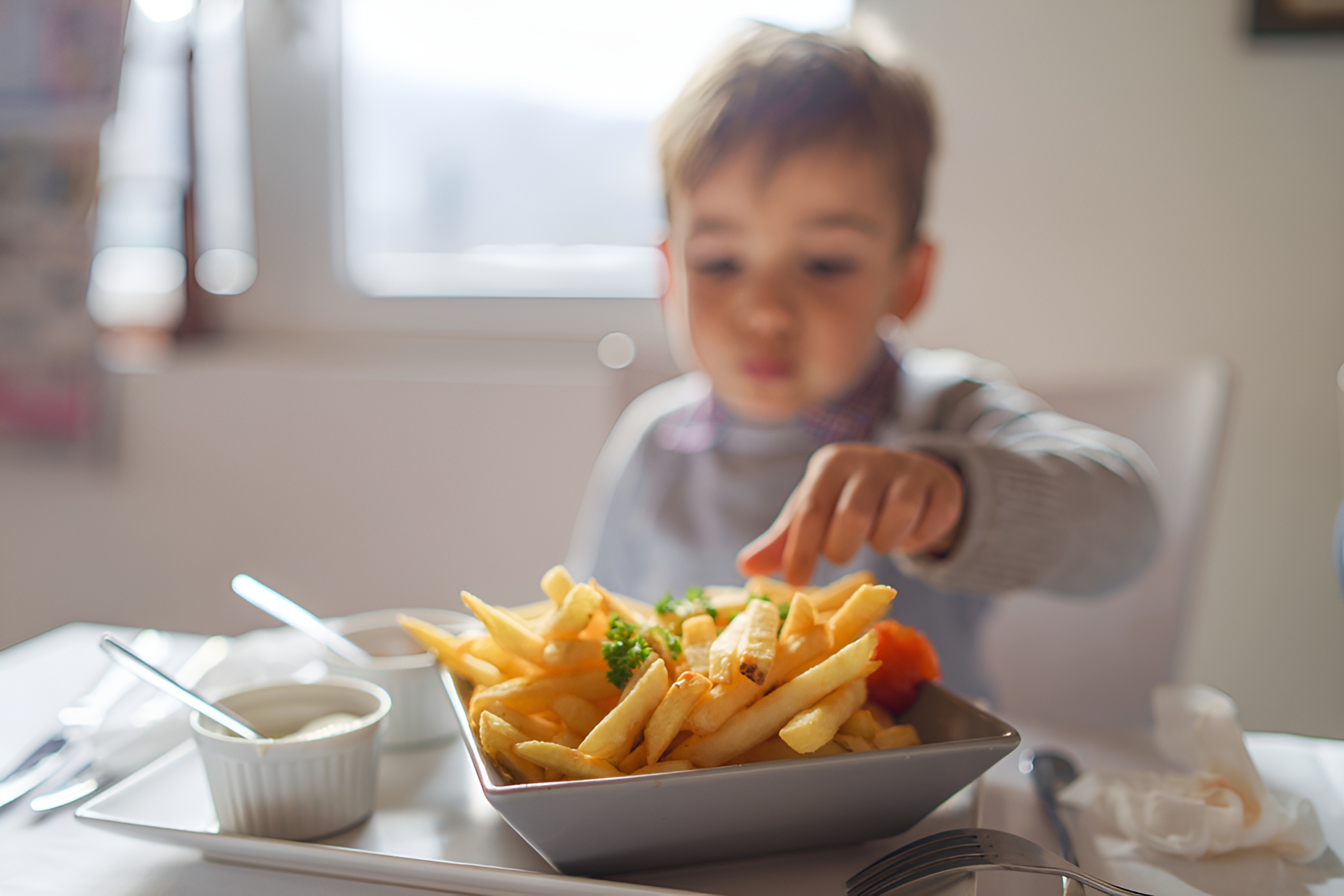 French Fries prepared from sliced potatoes and cooked until golden brown, showcasing crisp texture and visual appeal